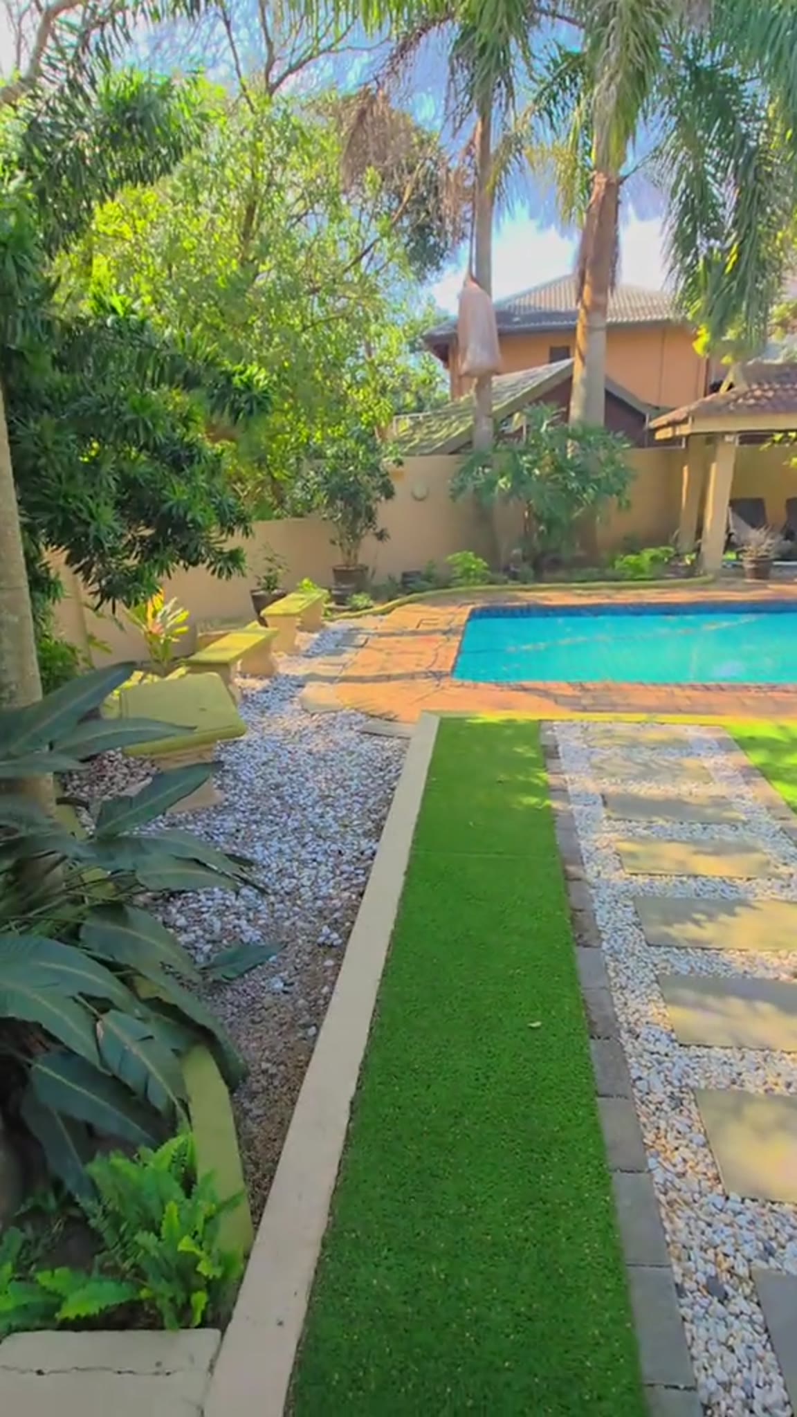 Poolside lawn and planted border